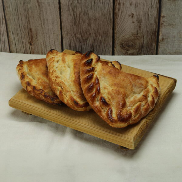 Empanada de cajeta y/o piña 